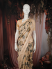 Light Peach Floral Woven Design Pure Tussar Saree with Designer Border