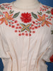 Light Peach Floral Designed Net Salwar Suit
