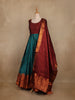 Maroon And Peacock Blue Floral Woven Banarasi Silk Gown With Dupatta
