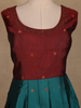 Maroon And Peacock Blue Floral Woven Banarasi Silk Gown With Dupatta