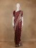Maroon Floral Woven Banarasi Silk Saree with Designer Zari And Sequin Border