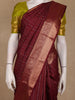 Maroon Striped Woven Pure Kanchipuram Silk Saree With Zari Border