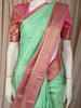 Mint Green Leaf Butta Zari Woven Design Pure Kanchipuram Silk Saree with Contrast Varisai Pattu Border