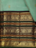Mint Green Butta Zari Woven Design Pure Kanchipuram Silk Saree with Contrast Varisai Pattu Border