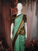 Mint Green Butta Zari Woven Design Pure Kanchipuram Silk Saree with Contrast Varisai Pattu Border