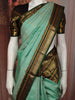 Mint Green Butta Zari Woven Design Pure Kanchipuram Silk Saree with Contrast Varisai Pattu Border
