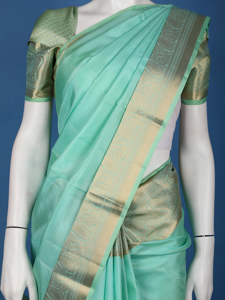 Mint Green Solid Design Woven Zari Border Silk Saree - Diadem