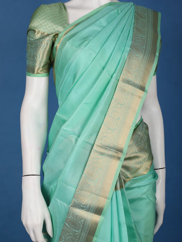 Mint Green Solid Design Woven Zari Border Silk Saree - Diadem