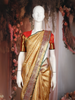 Mustard Gold Floral Woven Design Pure Kanchipuram Silk Bridal Saree with Contrast Red Border
