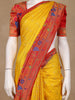 Mustard Yellow Checks Design Silk Saree with Red Border And Peacock Motifs