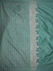 Muted Teal Green Floral Butta Zari Woven Design Semi Banarasi Saree with Zari Border