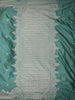 Muted Teal Green Floral Butta Zari Woven Design Semi Banarasi Saree with Zari Border