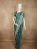 Muted Teal Green Floral Butta Zari Woven Design Semi Banarasi Saree with Zari Border