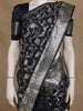 Navy Blue Floral Woven Banarasi Silk Saree With Silver Zari Border