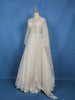 Off-White Heavy Sequins And Beads Embroidered Net Bridal Lehenga Set