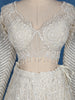 Off-White Heavy Sequins And Beads Embroidered Net Bridal Lehenga Set