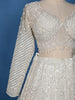 Off-White Heavy Sequins And Beads Embroidered Net Bridal Lehenga Set