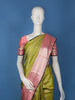 Olive Green Floral Woven Kanchipuram Silk Saree With Contrast Pink Zari Border