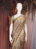 Olive Green Kalamkari Printed Semi Silk Saree with Contrast Border