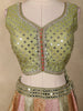 Olive Green Mirror Work Banarasi Silk Lehenga Set with Multicolor Panel Skirt