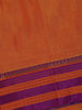 Orange Solid Design Semi Silk Cotton Saree with Contrast Purple Border