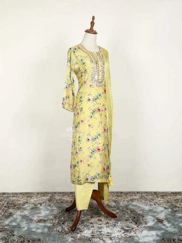 Lemon Yellow Straight Cut Salwar Suit Adorned with Floral Prints and Mirror work along with Dupatta - Diadem