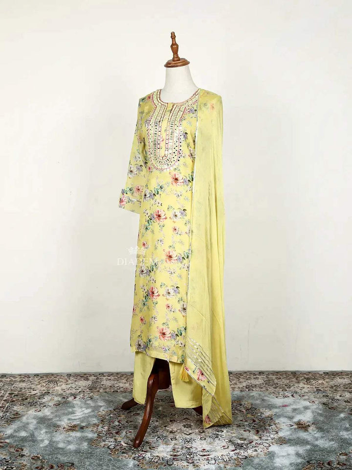 Lemon Yellow Straight Cut Salwar Suit Adorned with Floral Prints and Mirror work along with Dupatta - Diadem