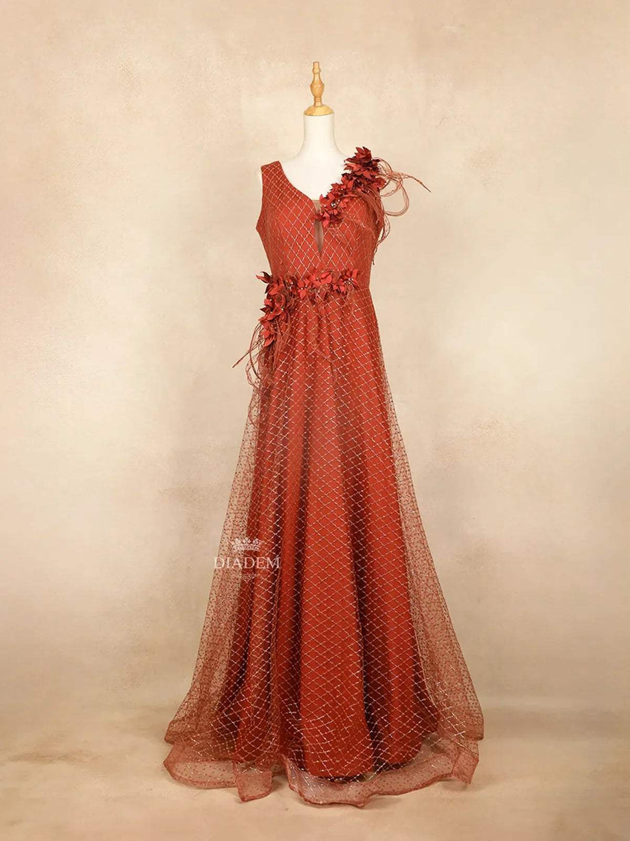 Stunning Orange Net Gown with Criss Cross Design at Diadem Store