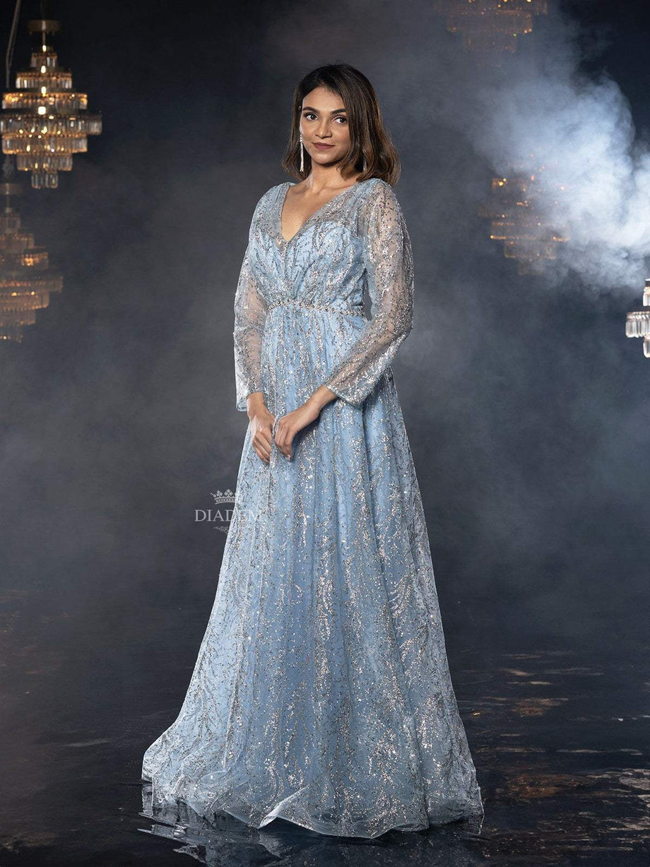 Buy Blue Net Gown Online with Pearl Glitter Floral Design Diadem