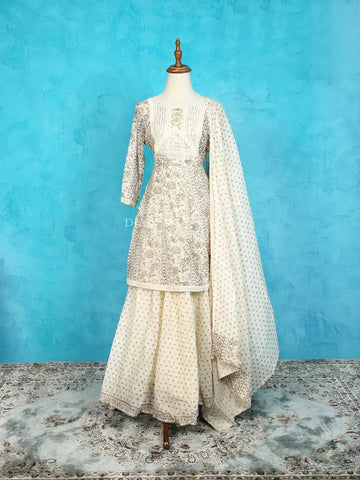 Ivory Sharara Suit Adorned with Floral Prints and Thread work along with Dupatta - Diadem