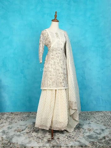 Ivory Sharara Suit Adorned with Floral Prints and Thread work along with Dupatta - Diadem