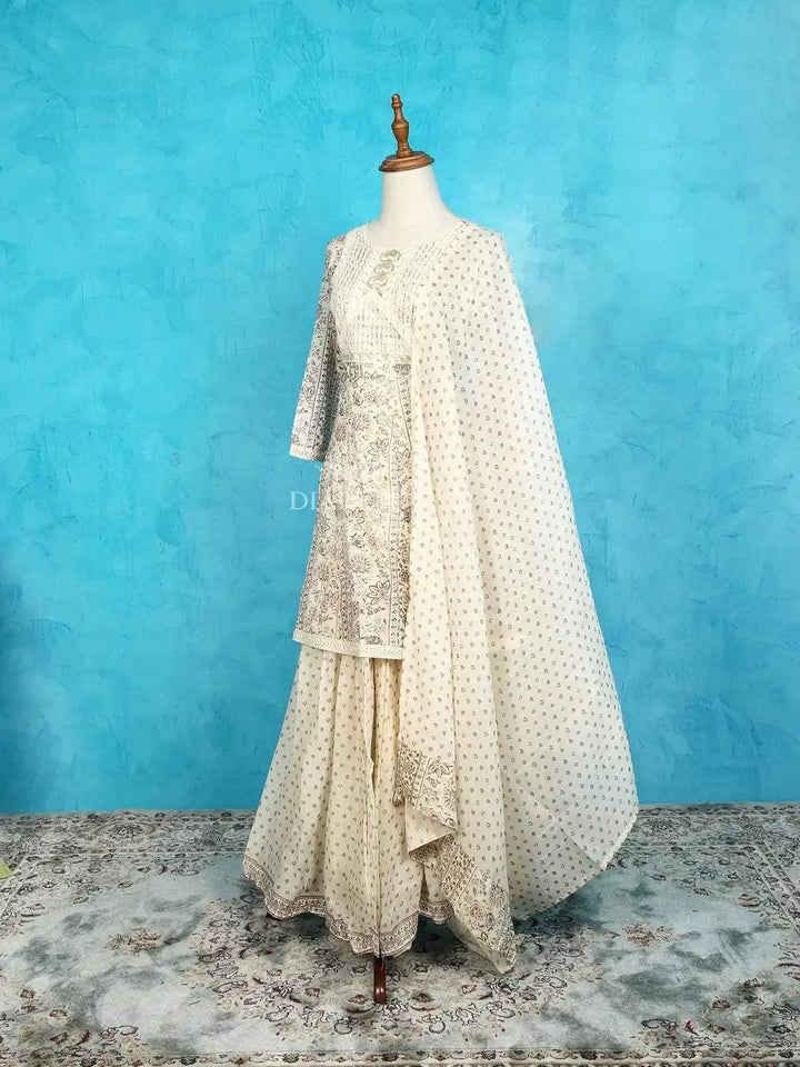 Ivory Sharara Suit Adorned with Floral Prints and Thread work along with Dupatta - Diadem