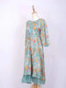 Turquoise Kurti Enhanced with Floral Prints and Sequins along with Waist Belt