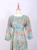 Turquoise Kurti Enhanced with Floral Prints and Sequins along with Waist Belt