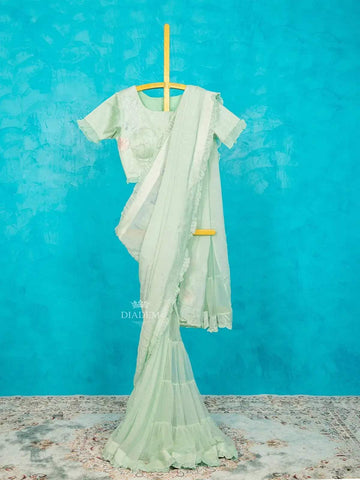 Mint Chiffon Ruffle Saree Adorned with Floral Thread work along with Ruffle Blouse - Diadem