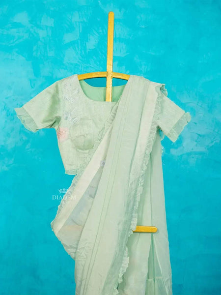 Mint Chiffon Ruffle Saree Adorned with Floral Thread work along with Ruffle Blouse - Diadem