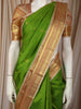 Parrot Green Leaf Butta Zari Woven Design Pure Kanchipuram Silk Saree with Contrast Varisai Pattu Border