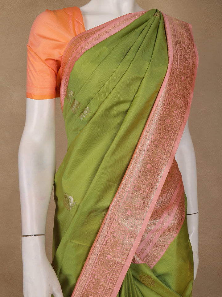 Parrot Green Peacock Motif Woven Soft Silk Saree With Peach Zari Border - Diadem