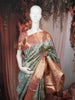 Pastel Mint Green Floral Vine Zari Woven Design Pure Kanchipuram Silk Bridal Wear Saree with Contrast Zari Border