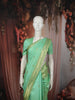 Pastel Pista Green Circle Butta Zari Woven Design Pure Kanchipuram Silk Saree with Zari Border