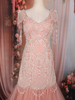 Peach Floral Sequins Embroidered Net Mermaid Gown with Beaded Tassel Sleeves