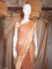 Peach Gold Butta Woven Design Tissue Saree with Gold Zari Border