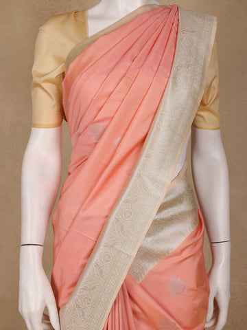 Peach Leaf Woven Soft Silk Saree With Beige Contrast Border - Diadem