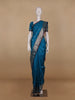 Peacock Blue Floral And Diamond Motifs Zari Weaving Soft Silk Saree - Diadem