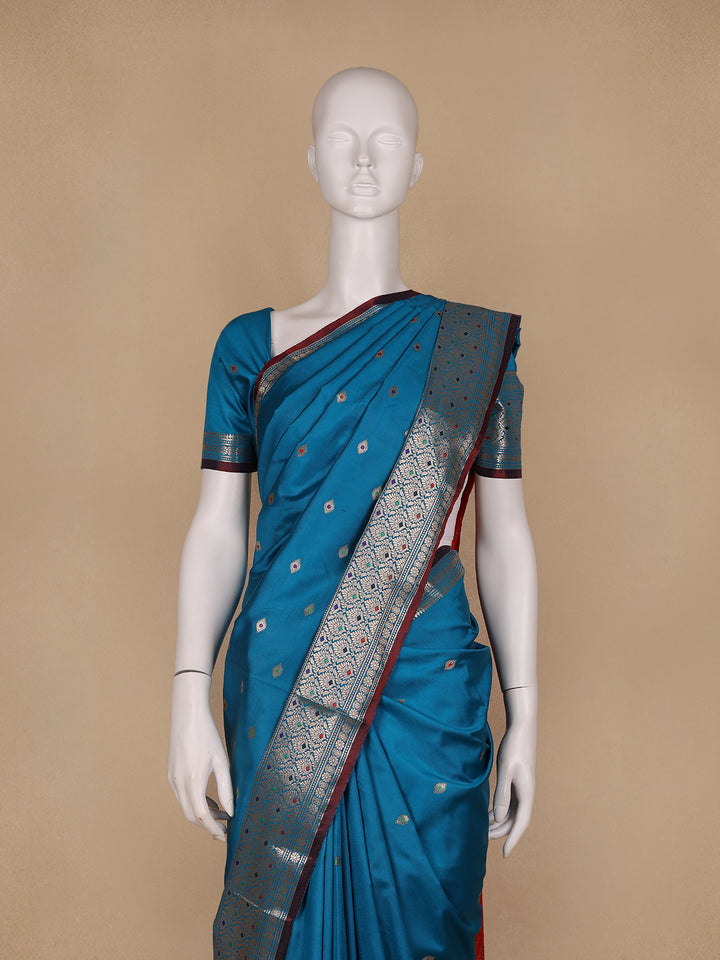 Peacock Blue Floral And Diamond Motifs Zari Weaving Soft Silk Saree - Diadem