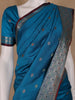 Peacock Blue Floral And Diamond Motifs Zari Weaving Soft Silk Saree - Diadem