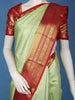 Pista Green Brocade Woven Pure Kanchipuram Silk Saree With Contrast Red Zari Border