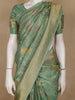 Pista Green Floral Woven Banarasi Silk Saree with Zari Border - Diadem