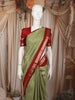 Pistachio Green Paisley Butta Zari Woven Design Pure Kanchipuram Silk Saree with Contrast Double Zari Border