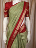 Pistachio Green Paisley Butta Zari Woven Design Pure Kanchipuram Silk Saree with Contrast Double Zari Border